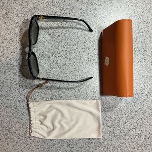 Tory Burch black with gold logo sunglasses.